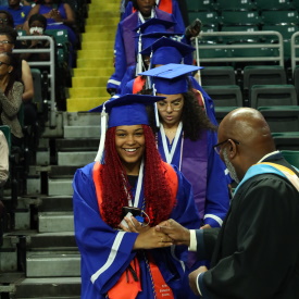 Students and staff celebrate graduation for The STEAM Academy at McCluer South-Berkeley